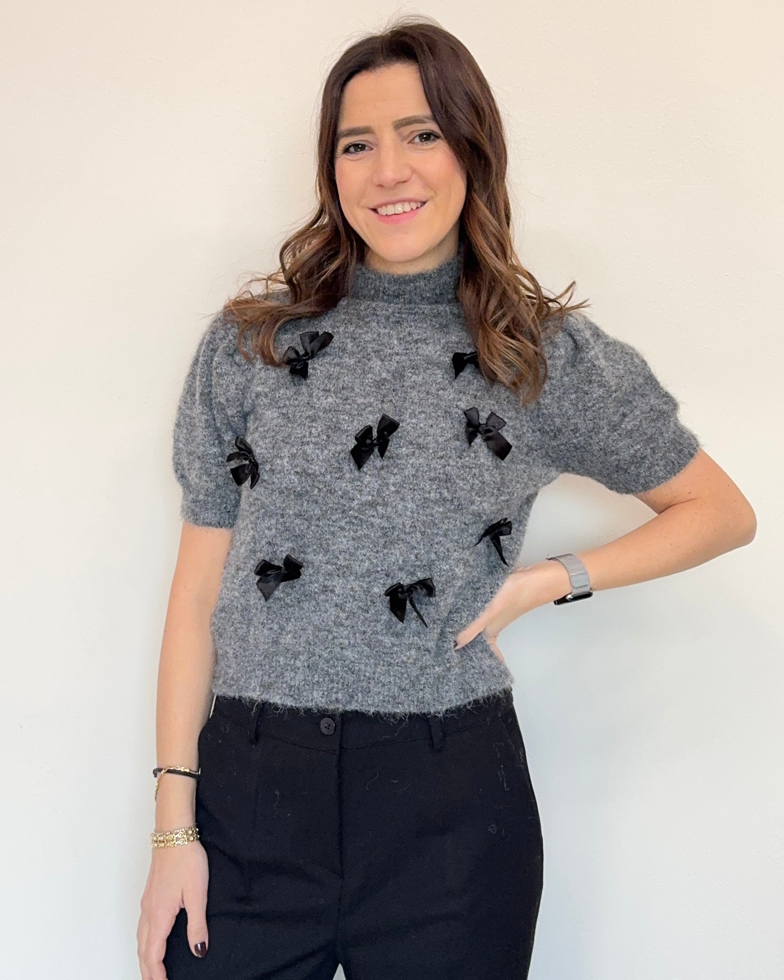 Maglioncino fiocchetti